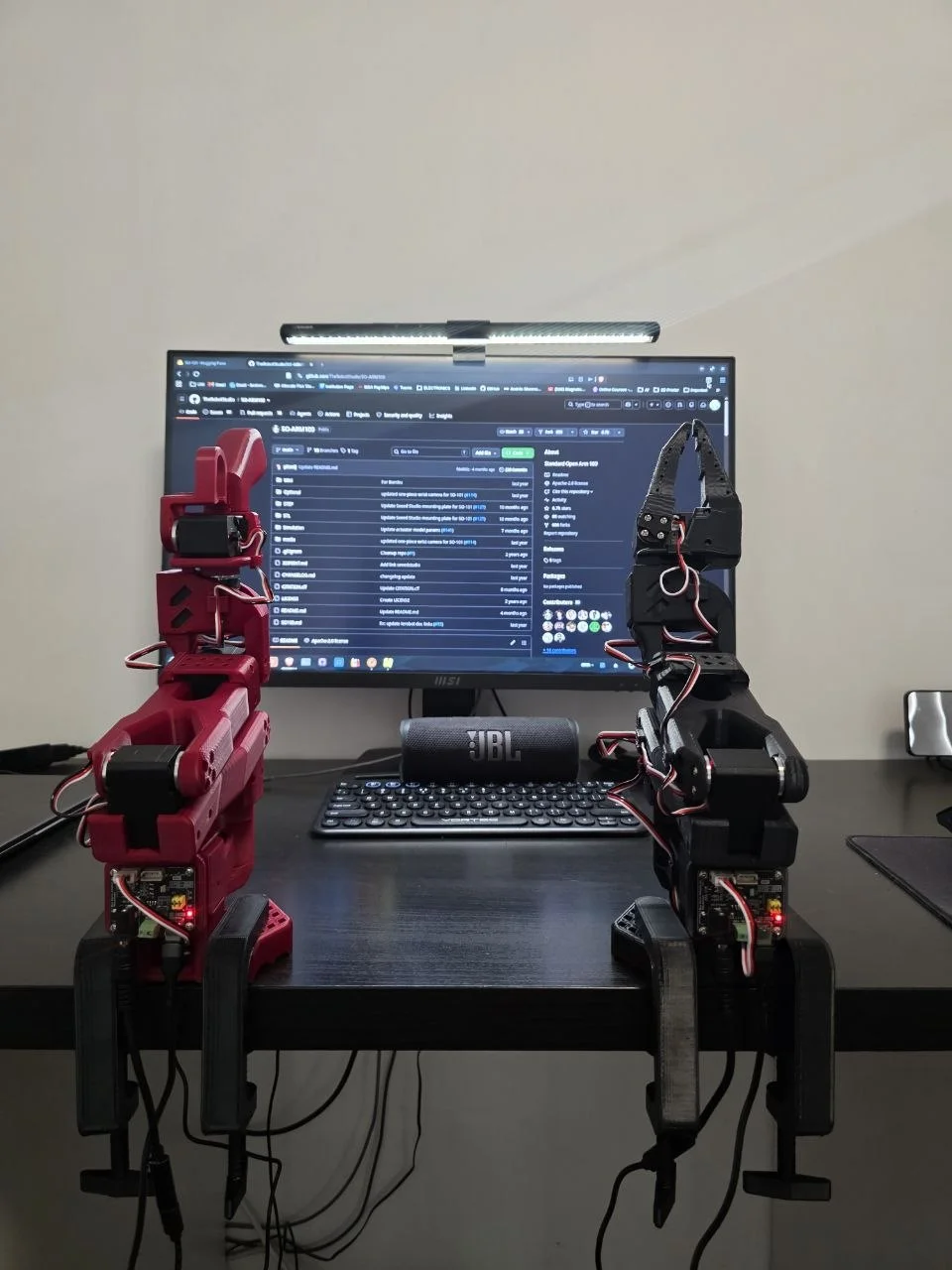 Both arms facing monitor